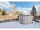 Small storage shed in snowy backyard at 10975 Birch Dr, Thornton, CO 80233