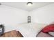 Basement bedroom with a queen-size bed and hardwood floors at 10975 Birch Dr, Thornton, CO 80233