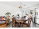 Dining area with wooden table, chairs, and access to the backyard at 10975 Birch Dr, Thornton, CO 80233