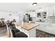 Modern kitchen with white cabinets, butcher block island, and stainless steel appliances at 10975 Birch Dr, Thornton, CO 80233