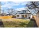 This home boasts a spacious backyard with a newly installed fence and a concrete patio, perfect for outdoor living and entertaining at 3041 S Bellaire S St, Denver, CO 80222