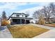 Well-maintained two-story home with a tidy front yard and modern curb appeal at 3041 S Bellaire S St, Denver, CO 80222