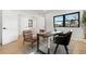 Bright office with black trim windows, hardwood floors, and modern decor, perfect for working from home at 3041 S Bellaire S St, Denver, CO 80222
