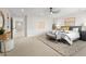 Bright bedroom featuring a comfortable bed, stylish decor, and ample space at 3041 S Bellaire S St, Denver, CO 80222