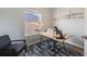 Bright home office featuring modern desk, chair, decor, and natural light from a window at 3932 Tejon St, Denver, CO 80211