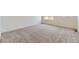 Cozy bedroom with soft carpeting and a bright window at 1286 S Algonquian St, Aurora, CO 80018