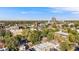 Expansive aerial view showcasing the property's proximity to lush greenery and the surrounding city skyline at 1372 Gaylord St # 4, Denver, CO 80206