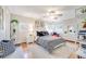 Bright bedroom with a large bed, stylish decor, and natural light at 1372 Gaylord St # 4, Denver, CO 80206