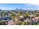 Breathtaking aerial panorama featuring a harmonious blend of urban and natural landscapes with city skyline at 1372 Gaylord St # 4, Denver, CO 80206