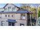 Charming home with intricate window designs, complemented by brick and traditional facade at 1372 Gaylord St # 4, Denver, CO 80206
