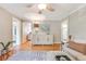 Open living room with hardwood floors and doorways that enhance the flow and connectivity of the home at 1372 Gaylord St # 4, Denver, CO 80206