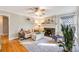 Relaxing living room with a fireplace and comfortable seating with natural light at 1372 Gaylord St # 4, Denver, CO 80206