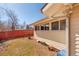 Backyard featuring a fence and part of the home's exterior with a window at 2370 S Meade St, Denver, CO 80219