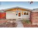 Inviting front entrance with well-maintained landscaping and a charming exterior at 2370 S Meade St, Denver, CO 80219