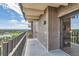 A spacious brick balcony is accessible through a glass door and offers a tranquil outdoor retreat at 480 S Marion Pkwy # 1601, Denver, CO 80209