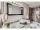 Bathroom featuring granite countertop, bowl sink, and shower with stone-look walls at 480 S Marion Pkwy # 1601, Denver, CO 80209