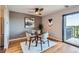 Cozy dining area with modern light fixture and hardwood floors at 480 S Marion Pkwy # 1601, Denver, CO 80209