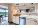 Kitchen featuring updated appliances, breakfast bar, and a great view at 480 S Marion Pkwy # 1601, Denver, CO 80209