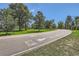 Picturesque park view featuring a bike and pedestrian path with clear markings amidst lush greenery and trees at 480 S Marion Pkwy # 1601, Denver, CO 80209