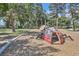 A bug-themed playground area nestled among mature trees, ideal for outdoor recreation at 480 S Marion Pkwy # 1601, Denver, CO 80209