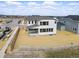 A spacious backyard with ample room for activities and potential landscaping, surrounded by neighborhood views at 16890 Black Rose Pl, Parker, CO 80134