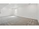 Spacious basement with neutral carpet, recessed lighting, and a window at 16890 Black Rose Pl, Parker, CO 80134