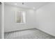 Finished basement with neutral carpet, window, and good natural light at 16890 Black Rose Pl, Parker, CO 80134