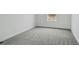Carpeted bedroom featuring neutral color palette and a window offering outside view at 16890 Black Rose Pl, Parker, CO 80134