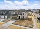 A charming two-story home with a two-car garage and a well-manicured front yard at 16890 Black Rose Pl, Parker, CO 80134