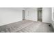 A neutral-colored main bedroom featuring an ensuite bath at 16890 Black Rose Pl, Parker, CO 80134