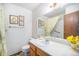 Clean bathroom with shower/tub combo and updated vanity at 3445 S Ammons St # 15-4, Lakewood, CO 80227