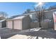 Attached two-car garage with ample parking space at 3445 S Ammons St # 15-4, Lakewood, CO 80227