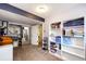 Spacious office featuring built-in bookshelves, providing ample storage and organization at 862 Centennial Way, Bennett, CO 80102
