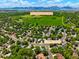 Panoramic aerial shot of 202 N Hoover Ave near Waremborg Open Space with mountain views in the distance at 202 Hoover Ave, Louisville, CO 80027