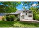 Charming home featuring well-maintained landscaping and a private entrance at 202 Hoover Ave, Louisville, CO 80027