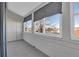 A bright porch with many windows and a door at 11115 E Alameda Ave # 203, Aurora, CO 80012