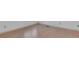 Bright room features light hardwood flooring and fresh white walls at 11115 E Alameda Ave # 203, Aurora, CO 80012