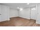 Spacious basement featuring modern flooring and neutral paint at 5140 W 9Th Ave, Denver, CO 80204