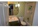 Bathroom features a combined shower and tub and traditional fixtures at 7250 County Road 5, Erie, CO 80516