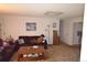 Cozy living room featuring comfortable furniture and neutral decor for a relaxing ambiance at 7250 County Road 5, Erie, CO 80516
