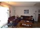 A cozy living room featuring comfortable couches, warm lighting, and a relaxed setting at 7250 County Road 5, Erie, CO 80516