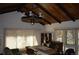 A spacious home office with wooden features, natural light, and room for productivity at 7250 County Road 5, Erie, CO 80516