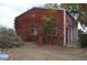 Exterior of the barn surrounded by fall colors and natural growth at 7250 County Road 5, Erie, CO 80516