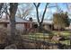Scenic shot of a ranch-style home with mature trees, a well-manicured lawn and tasteful design at 7250 County Road 5, Erie, CO 80516