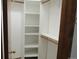 Walk-in closet with multiple levels of shelving for ample storage at 4812 S Bahama Way, Aurora, CO 80015