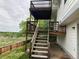 Exterior view of a two-story deck and access to yard space at 4812 S Bahama Way, Aurora, CO 80015