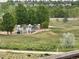 Community playground with picnic area and lush surrounding green space at 4812 S Bahama Way, Aurora, CO 80015