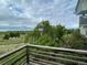 Balcony view showcasing lush green trees and open park space in the neighborhood at 4812 S Bahama Way, Aurora, CO 80015