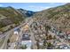 Aerial view of a mountain town with lush scenery, with natural beauty all around at 1104 Miner St, Idaho Springs, CO 80452