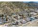 Charming neighborhood with colorful houses nestled against a scenic mountain backdrop at 1104 Miner St, Idaho Springs, CO 80452